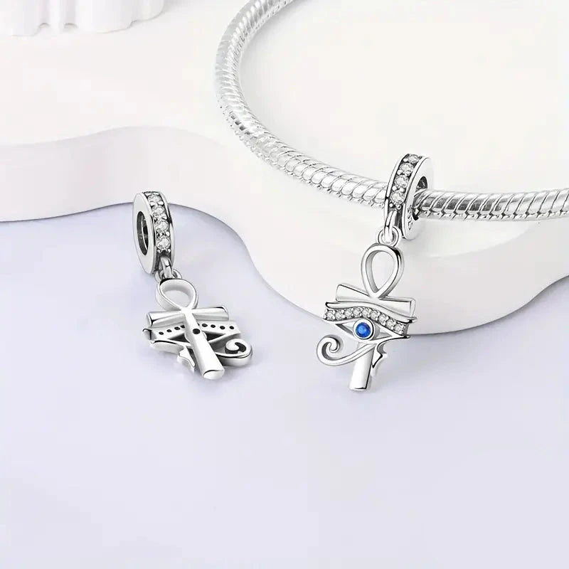 Charm Ojo Horus y Cruz Anj