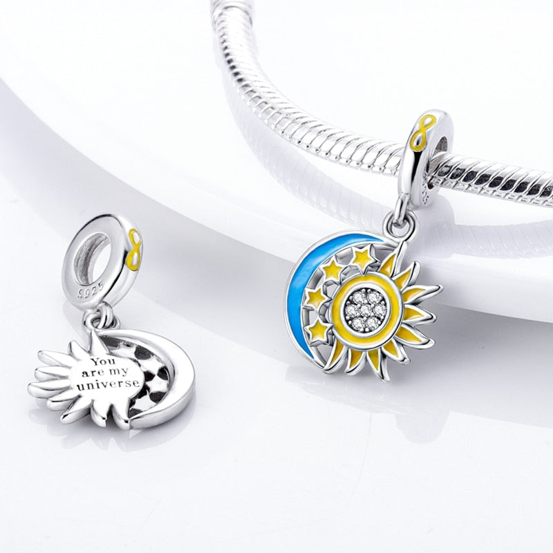 Charm Sol & Luna de Estrellas Fluorescentes