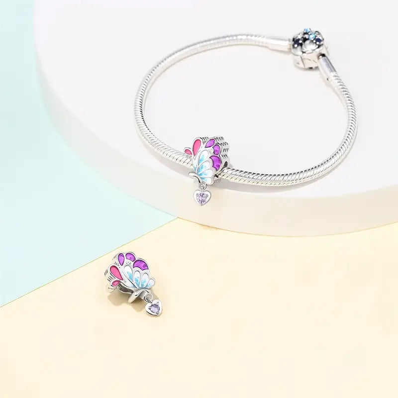 Charm Mariposa de la Armonía y Corazón Morado