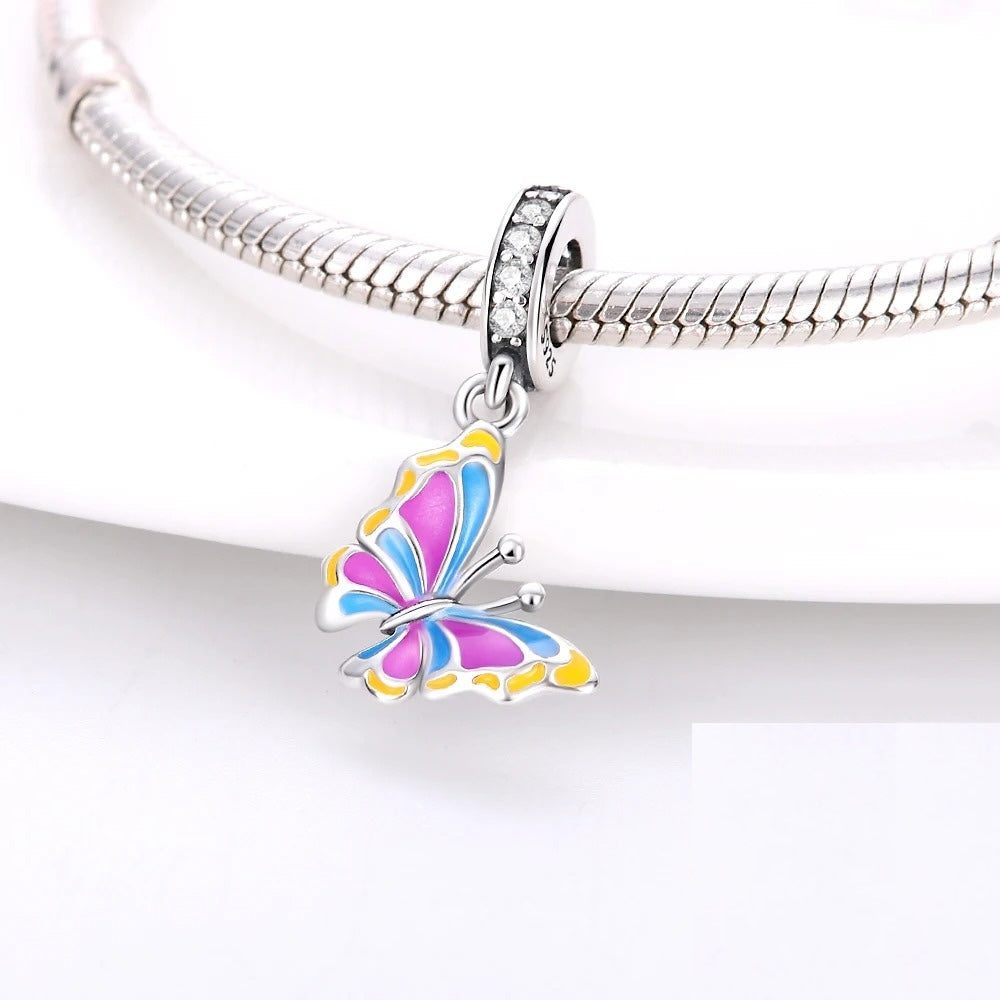 Charm Mariposa de Colores Fluorescente