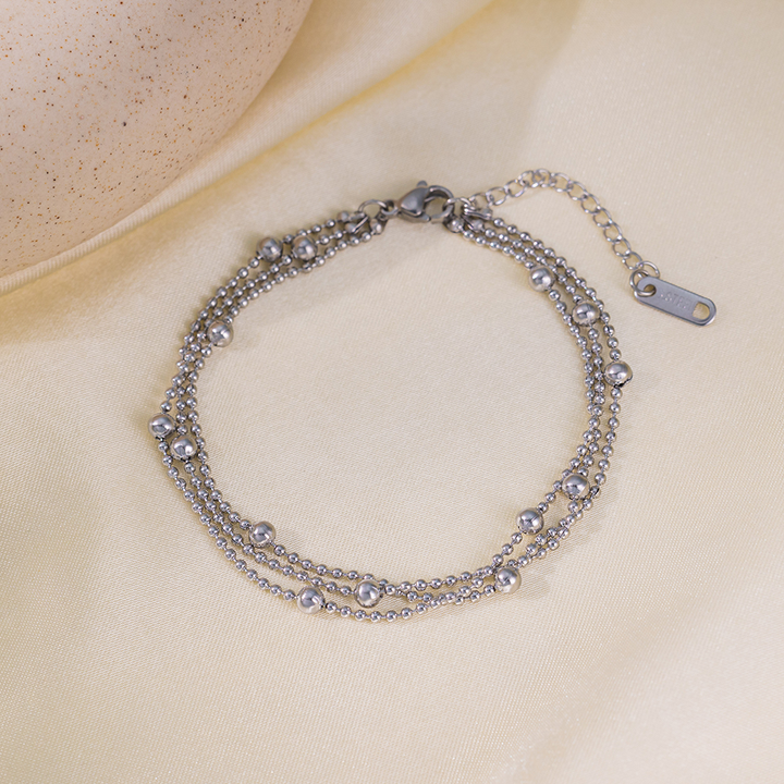 Brazalete Triple de Bolitas Plateadas