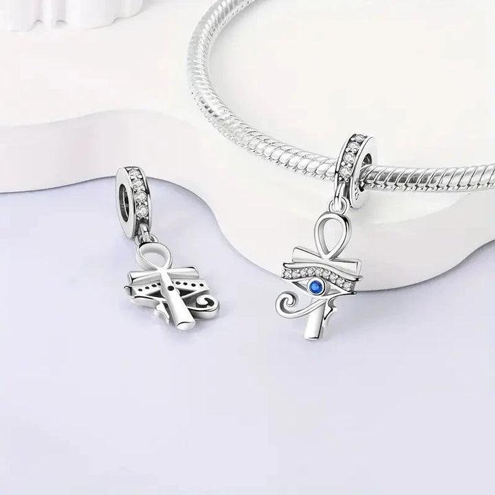 Charm Ojo Horus y Cruz Anj