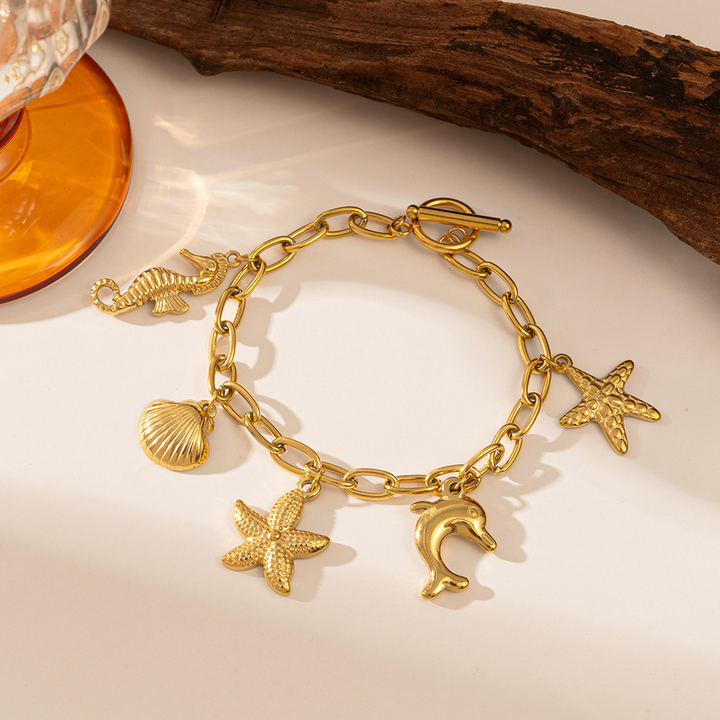 Brazalete Conchas Doradas