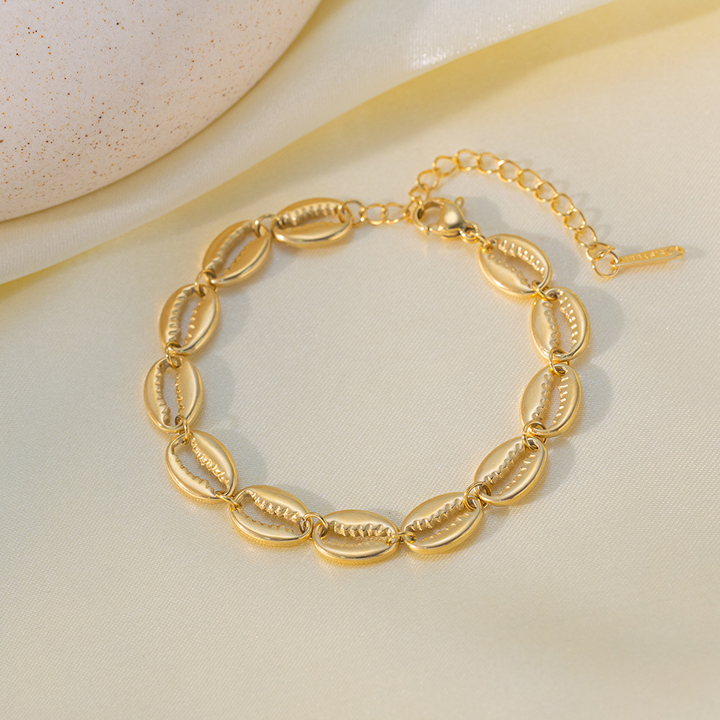 Brazalete Conchas Doradas