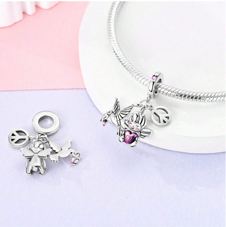 Charm Paloma, Angelito y Símbolo de Paz