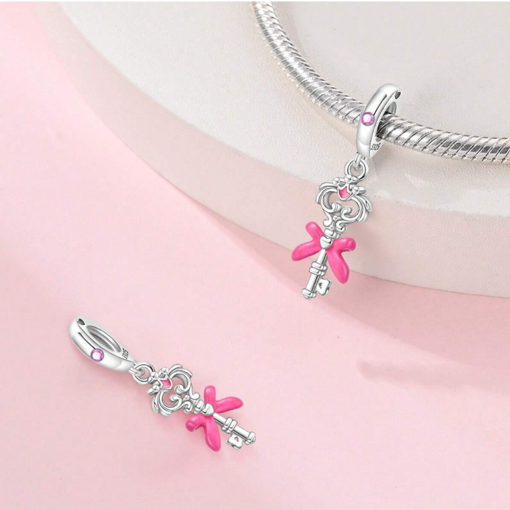 Charm Llave de Moño Rosa