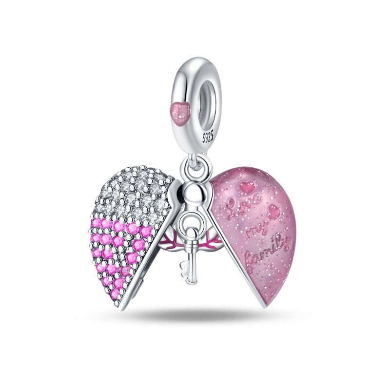 Charm Corazón Rosa y Llave Voladora