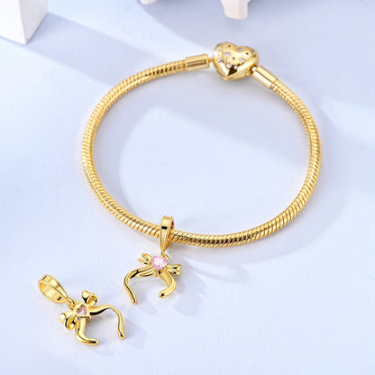 Charm Moño Dorado