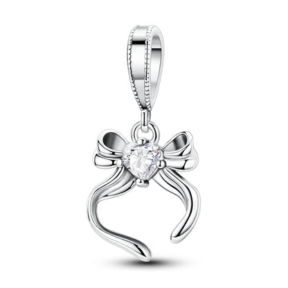 Charm Moño Plateado