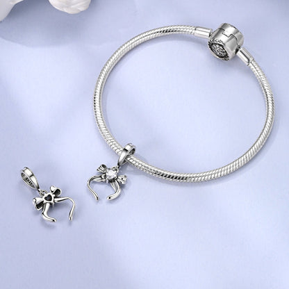 Charm Moño Plateado
