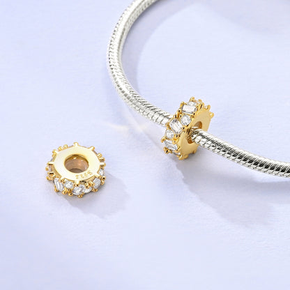 Charm Dorado con Brillos Plateados