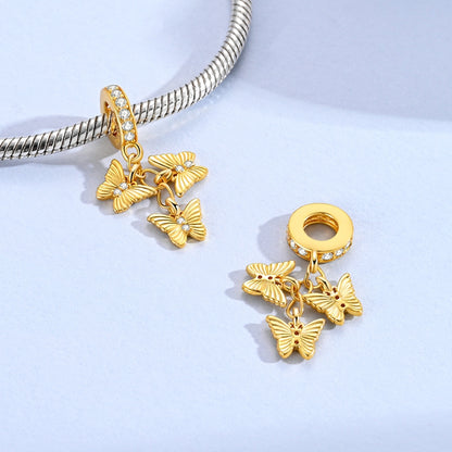 Charm Mariposas Doradas