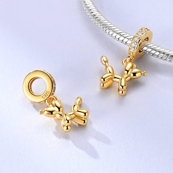 Charm Globo Dorado