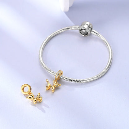 Charm Globo Dorado