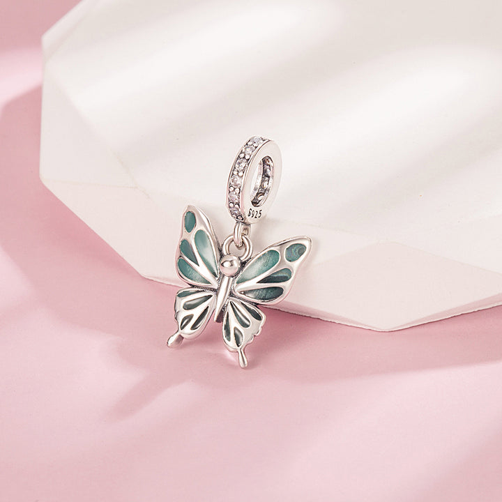 Charm Mariposa Fluorecente