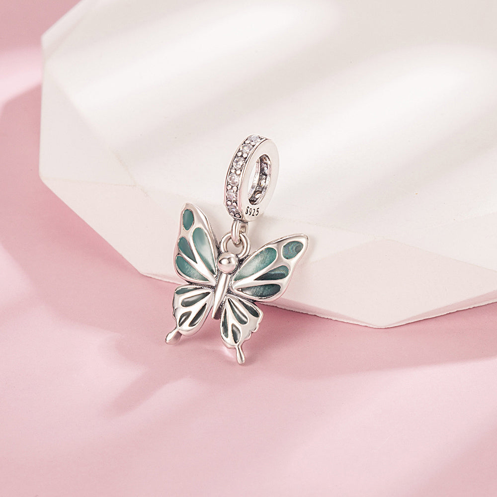 Charm Mariposa Fluorecente