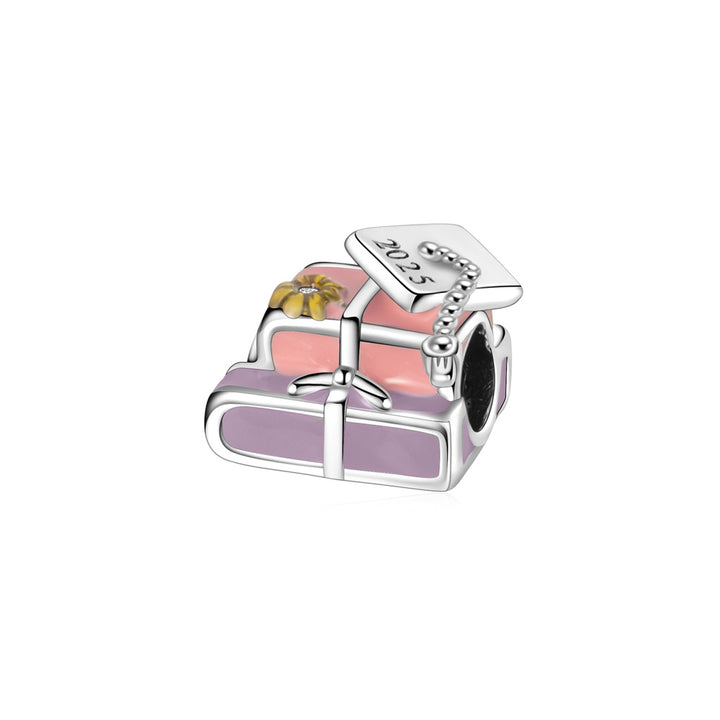 Charm Libros & Birrete
