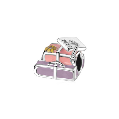 Charm Libros & Birrete