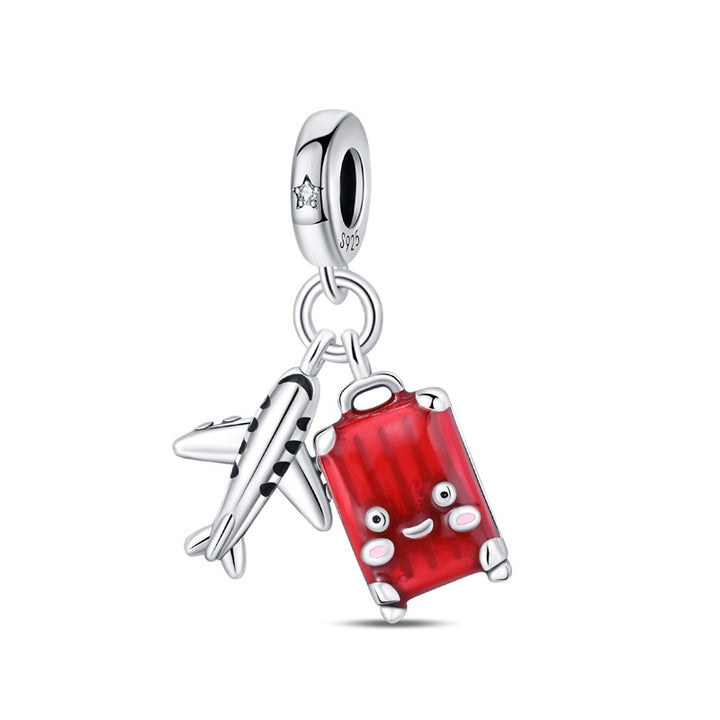 Charm Avion y Maleta Roja