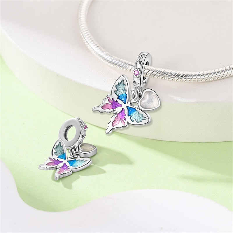 Charm Mariposa y Corazón Blanco
