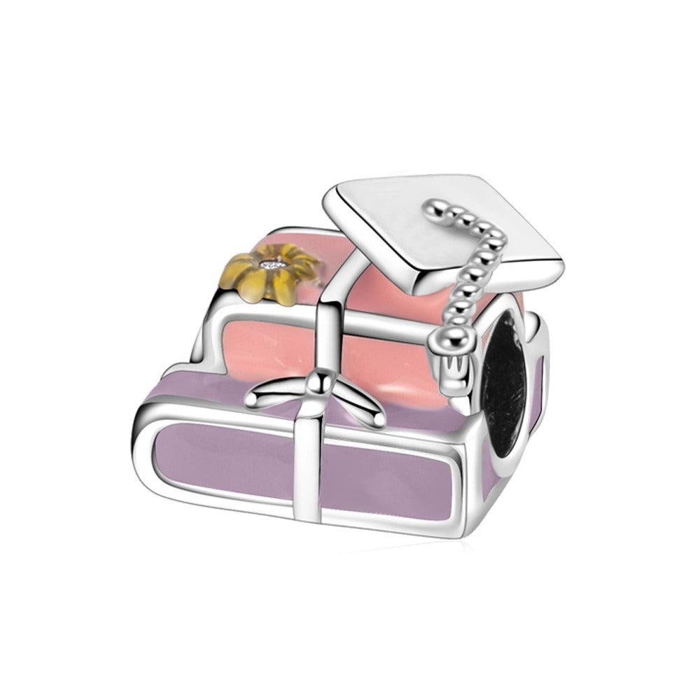 Charm Libros & Birrete