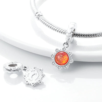 Charm Sol Rojo