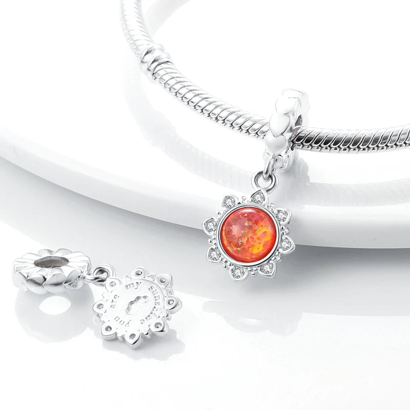 Charm Sol Rojo