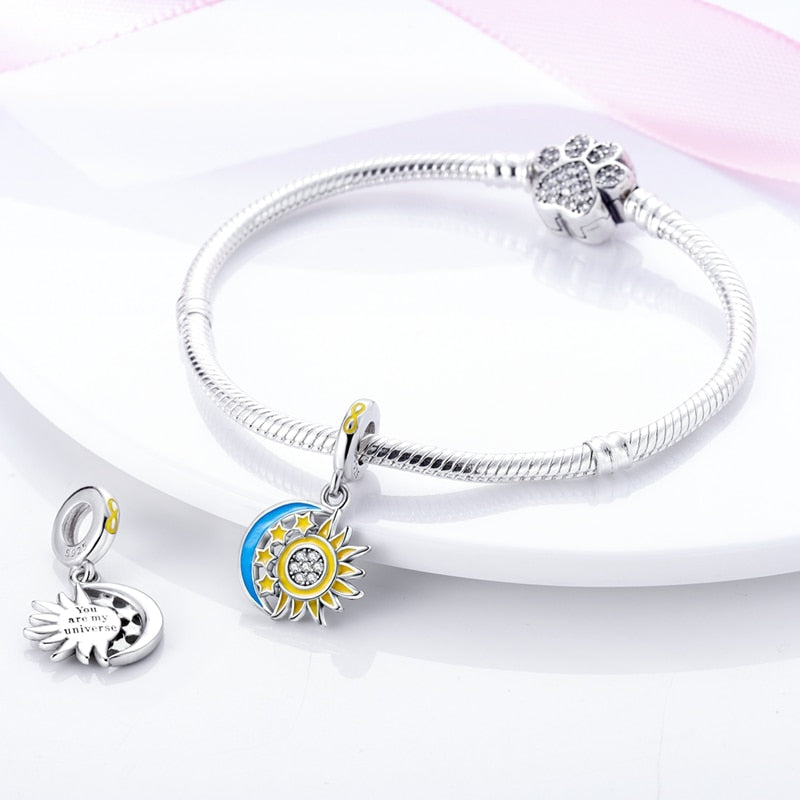 Charm Sol & Luna de Estrellas Fluorescentes