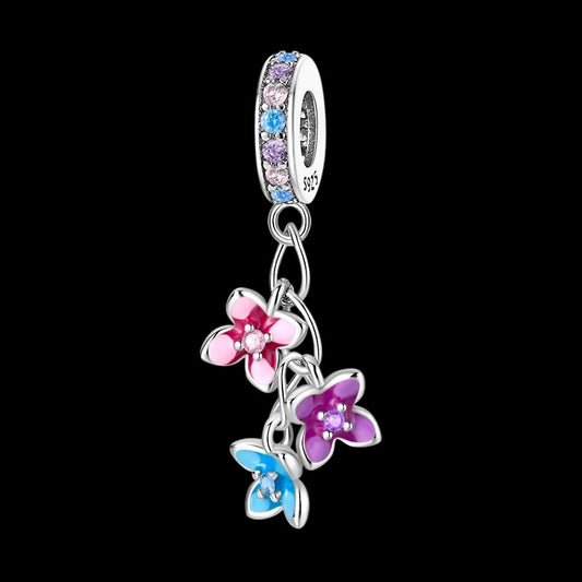 Charm Flor Rosa, Morada y Azul